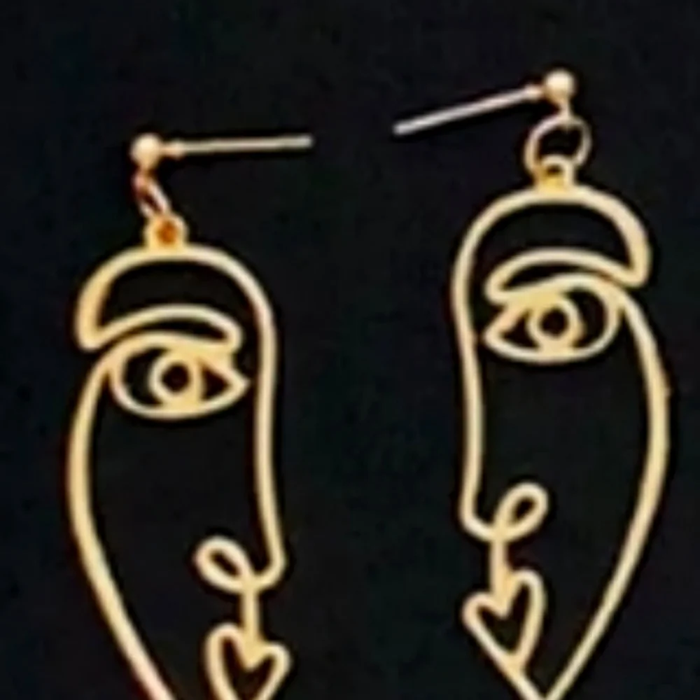 Gold Abstract Cut Out Face Earrings - Picture 4 of 4